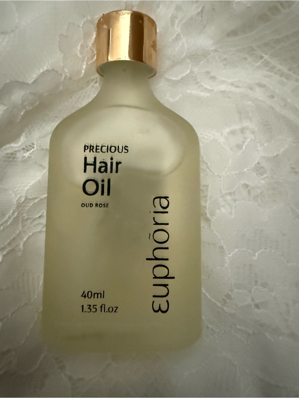 Euphoria Precious Oud Rose Hair Oil — Cream & Gold Bottle